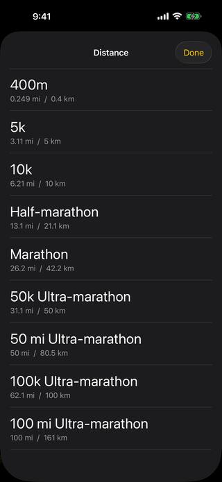 The race distance list: 400m, 5k, 10k, half-marathon, marathon, and the 50k, 50 mile, 100k and 100 mile ultra-marathons, each showing both miles and kilometers.